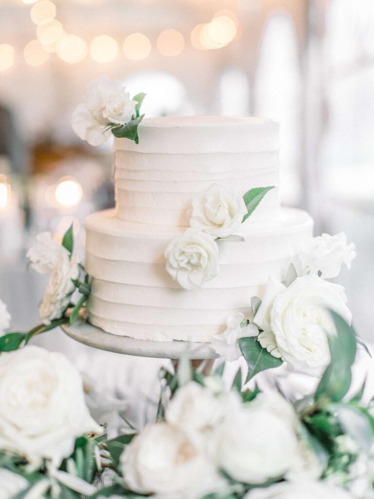 Beautiful White buttercream cake with edible sugar flowers