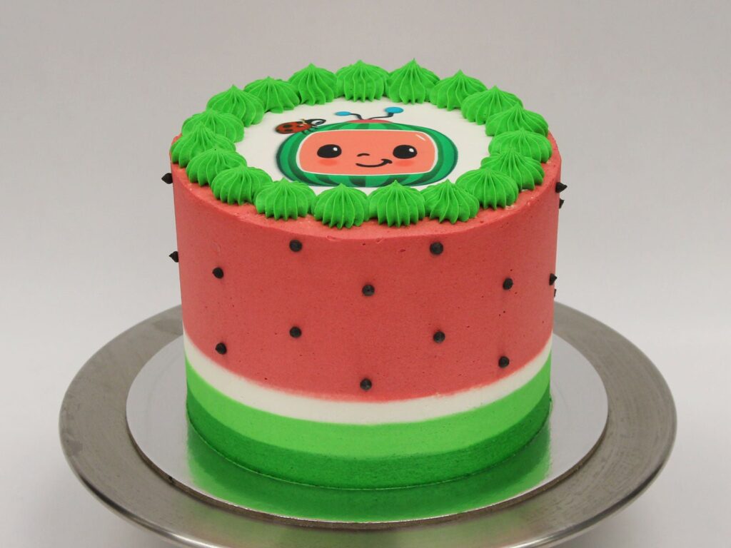 Cocomelon Birthday Cake With Adorable Watermelon Seed Icing And Watermelon Topper