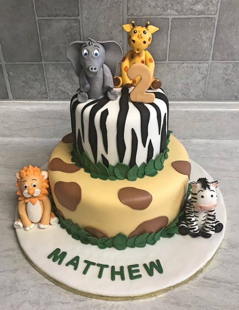 2-Tiered Birthday Cake with Giraffe and Hippo Figurine